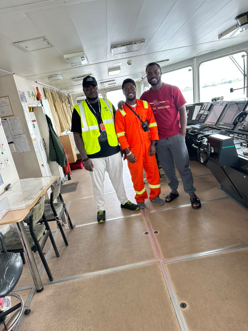 Marine personnel aboard a vessel bridge